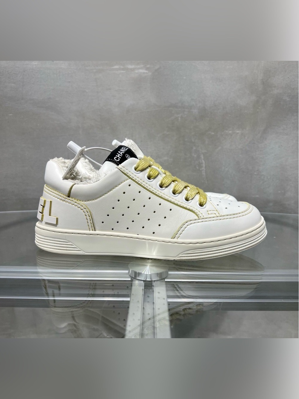 CHANEL White Leather Sneakers with Yellow Accents
